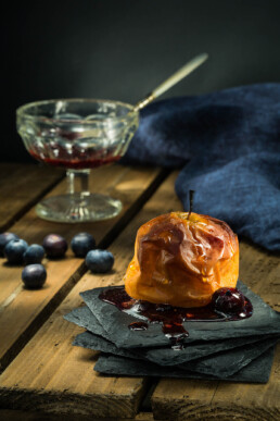 Roasted apple desert with blueberry comfi